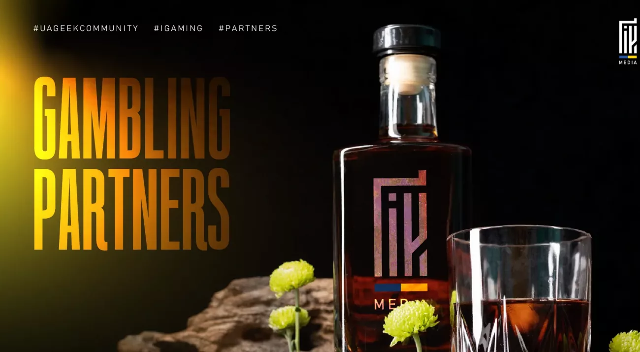 A stylish banner featuring a whiskey bottle labeled “UAGeek Media” with the headline “Gambling Partners” in a warm gradient on a dark background.